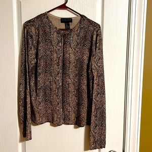 Long sleeve silk knit top.